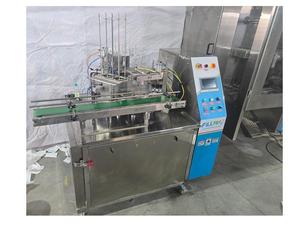 Machine de remplissage et de scellage manuelle haut de gamme à 12 stations, haute précision, haute productivité, en acier inoxydable, pour lait et yaourt glacé - Product Image 2
