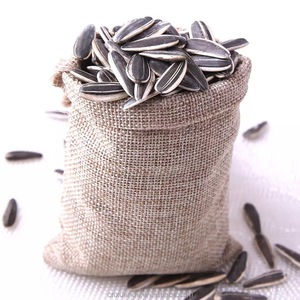 Graines de tournesol séchées brutes, graines d'huile noires, en vrac, pour l'alimentation humaine et la nourriture des oiseaux, collation agricole - Product Image 1