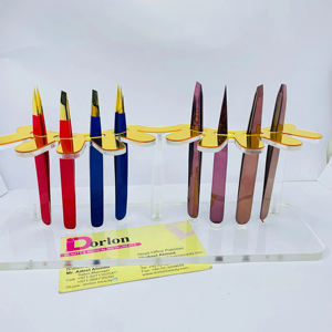 Pince à sourcils Dorlon en acier inoxydable revêtue de couleur or rose pour épiler les poils incarnés certifiés CE ISO - Product Image 1