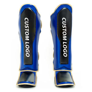 Protège-tibias de boxe MMA tendance 2025, noir et bleu, en cuir, avec boucle et crochet, équipement de protection, absorption des chocs, léger et durable - Product Image 1