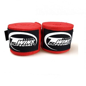 นวมมวยไทย MMA รุ่น High Yellow Twins สำหรับฝึกซ้อม พร้อมผ้าพันมือด้านใน ทำจากผ้าฝ้ายและหนังแท้  รับสกรีนโลโก้  แบบผูกเชือก ปิดนิ้วมือเต็มรูปแบบ - Product Image 2