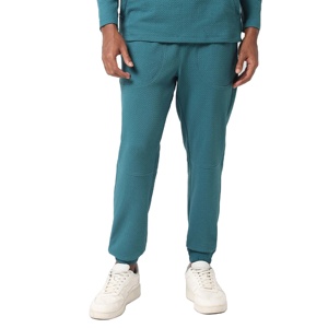 Pantalones de yoga ligeros ecológicos para hombre: tela sostenible y elástica, diseñados para el fitness y el uso diario - Product Image 1
