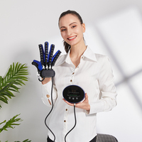 Équipement de rééducation des mains Machine de massage électrique AVC Patients Machine d'exercice des doigts