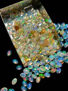 Cabujones de ópalo natural etíope 4x6mm Piedras preciosas sueltas blancas ovaladas Varias cantidades disponibles - Product Image 5