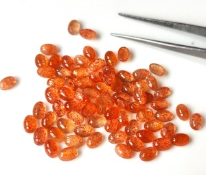 Piedra solar naranja natural cabujón ovalado suelto 3x5mm-10x14mm piedra preciosa trasera plana para la fabricación de joyas - Product Image 6