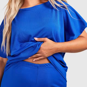 Pantalones cortos de verano de 2 piezas de alta calidad con diseño de cuello redondo para mujer, conjunto de patrón sólido hasta la rodilla de poliéster/algodón de secado rápido - Product Image 4