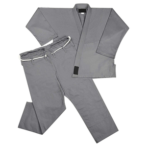 Combinaison de judo conçue pour l'entraînement et la compétition, fabriquée en tissu de coton durable offrant confort et résistance pour la pratique quotidienne au dojo. - Product Image 5