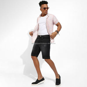 Nardon Apparel Pantalones cortos vaqueros sueltos para hombres Ropa de calle de verano Elástico Sólido 100% Poliéster Moda Cargo Shorts - Product Image 1