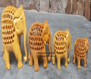 Wooden Carved <b>Elephant</b> Statues Set 4 Pcs <b>Elephant</b> Set Wooden <b>Decorative</b> Elehphant Statue Set From India Wooden <b>Elephant</b> - Product Image 1