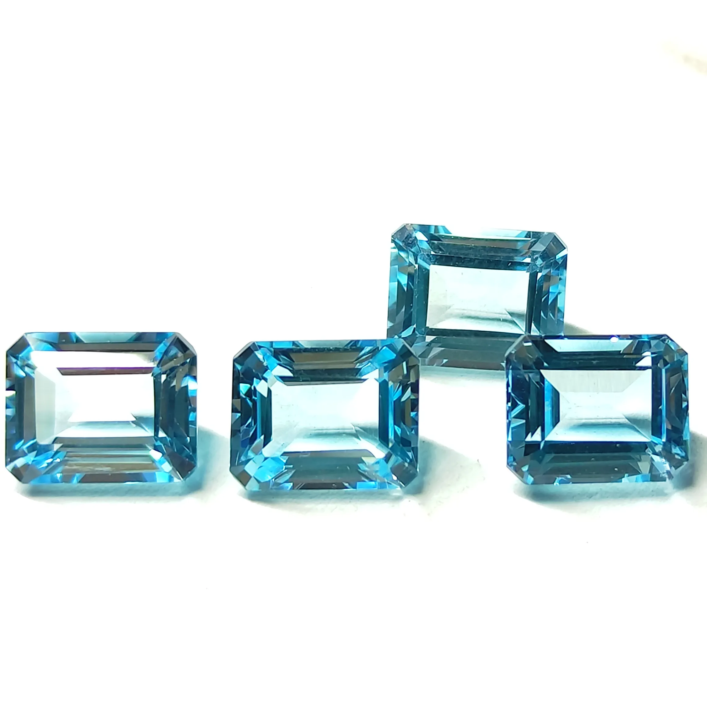 High Quality Sky Blue Topaz 6x4mm Faceted Emerald Cut Loose Topaz Gemstones At Wholesale price From Indian Manufacturer