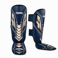 Protège-tibias TOPN MMA Muay Thai personnalisés en usine, en PU, pour adultes, entraînement de kickboxing, protection professionnelle, légers et souples, pour la boxe sur pied