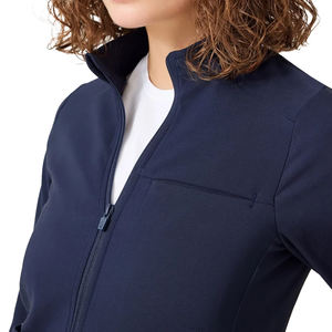 Uniformes de poliéster de algodón antiarrugas transpirables con bolsillos de Pakistán para enfermeras con cuello en V sólido de alta calidad - Product Image 2