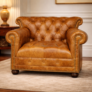 Sillón Clásico de Cuero con Construcción Resistente y Acolchado Confortable para Decoración Tradicional del Hogar - Product Image 1