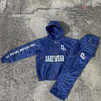Conjunto Deportivo Unisex de Nylon con Capucha, Chaqueta Cortavientos y Pantalones de Dos Piezas con Logotipo Personalizado, Conjuntos Cortavientos de Poliéster para Otoño