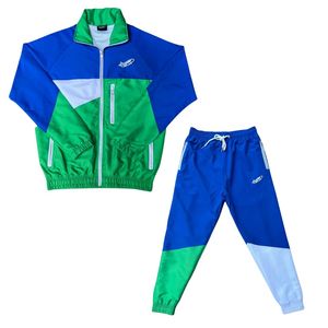 Chándal de bloque de color, chaqueta y pantalones de chándal con cremallera completa, conjunto atlético de poliéster 100%, ajuste deportivo con bolsillos con cremallera y logotipo 3D - Product Image 1