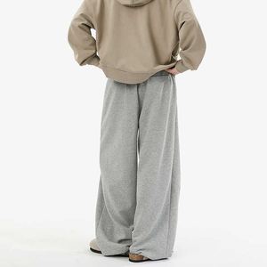 กางเกงผู้ชายทรงตรงแบบลำลอง เอวยางยืด ผ้าโพลีเอสเตอร์ 100% ไม่เป็นขุย กันน้ำ ซักได้ สไตล์สตรีทแวร์ น้ำหนักปานกลาง ทรงหลวม ใส่ได้ทั้งชายและหญิง - Product Image 4