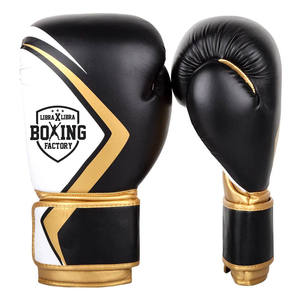 Vente en gros Gants de boxe professionnels personnalisés de qualité supérieure en cuir synthétique pour l'entraînement en plein air en Muay Thai MMA - Product Image 1