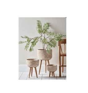 Support d'affichage élégant de pot de jardinière en rotin et en fer pour la maison, l'intérieur et l'extérieur. - Product Image 1
