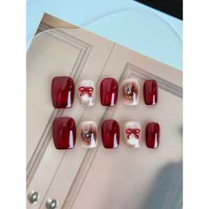 Ruby Ribbon - Uñas Postizas Elegantes con Diseños Decorativos para Mujeres y Hombres - Product Image 1