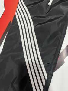 Pantalon coupe-vent baggy pour homme 100% coton Pantalon de survêtement à jambes larges écologique Bandes brodées en nylon et polyester pour sublimation - Product Image 3