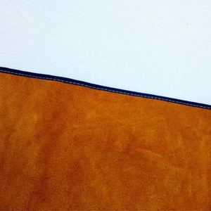 Venta al por mayor OEM ODM ropa de seguridad fabricada en fábrica logotipo personalizado tela suave cuero de vaca delantal de soldadura de alta resistencia - Product Image 5