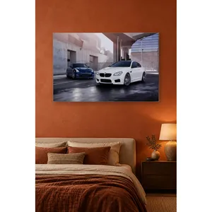 Impression sur toile Fida White BMW M6 et Blue GT-R sur fond d'architecture en béton - Product Image 1
