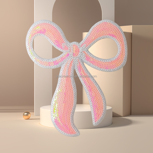 Patch brodé de sequins rose scintillant avec nœud pour accessoires de mode - Product Image 1