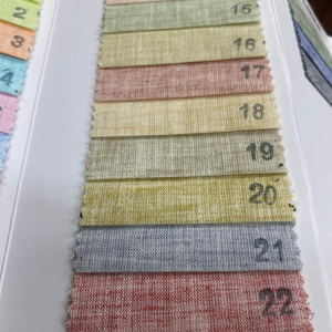 Tela de algodón para camisas de exportación de grado con tacto de lino tejido estilo flameado teñido liso para niñas niños vestidos uso de ropa internacional - Product Image 1