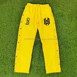 Pantalones de chándal con botones laterales personalizados al por mayor pantalones cortavientos de nailon acampanados con botones laterales personalizados para hombre Pantalones de nailon - Product Image 1