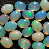 Opales éthiopiennes blanches naturelles 6x4mm de forme ovale Welo Opal Cabochon Cut Pierres pour bijoux Loose Multi Fire White Opal Cabs