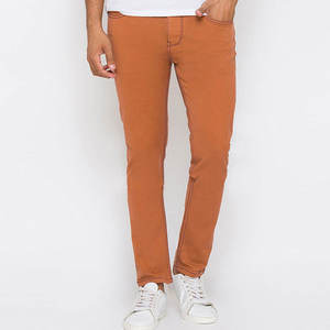 Venta al por mayor de pantalones vaqueros naranjas para hombres y mujeres, OEM Slim Fit Straight Fit algodón Skinny Jeans con dobladillo torneado - Product Image 2