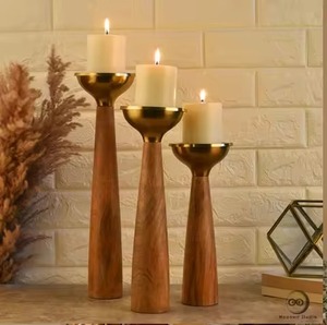 Set of three <b>tall</b> wooden candle holders with sleek brass metal tops modern cone base design - Product Image 1