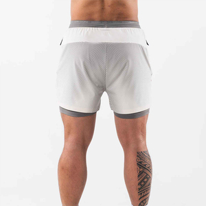 100% Shorts d'entraînement personnalisés de qualité ceinture élastique respirant Fitness entraînement genou longueur Shorts poches décontracté sublimé - Product Image 3