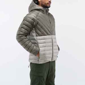 Chaqueta de Invierno Acolchada Personalizada para Hombre, con Cuello Alto, Logotipo Impreso en la Parte Delantera, Bolsillos y Estilo Urbano - Product Image 5