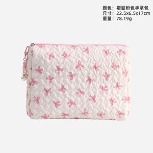 กระเป๋าเครื่องสำอางพัฟพร้อมจี้รูปริบบิ้น - Product Image 1