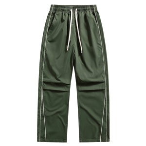 Bulk Wholesale Custom Men's Streetwear <b>White</b> Parachute Pants with Black Side Design Panels and Modern Piping Accents - Product Image 1