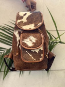 Vente en gros Sac à dos en fourrure de vache de grande capacité Sac de voyage multi-usage unisexe Style occidental à la mode Produit en vrac très vendu - Product Image 2