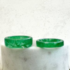 Modern <b>resin</b> napkin rings with metallic leaf accents embedded in <b>clear</b> <b>resin</b> for stylish minimalistic dinner tables - Product Image 2