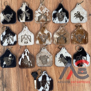 Vente en gros de porte-clés en cuir de vachette, gravure laser, porte-clés unisexe en cuir véritable de luxe, porte-clés d'accessoires - Product Image 1
