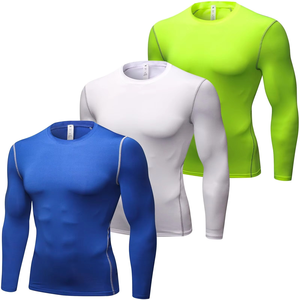 Maillot de compression Rash Guard noir et or, extensible dans 4 directions et en tissu anti-transpiration, partie d'un ensemble de combat essentiel pour le BJJ - Product Image 1