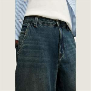 Jeans baggy pour hommes en denim bleu foncé 100% coton respirant avec boutons en dentelle lavés, coupe droite, taille large, vente en gros - Product Image 4