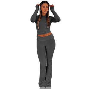 Conjunto de Yoga de 2 piezas de alta calidad para mujer con patrón sólido transpirable Logotipo frontal personalizado Cintura media Cierre elástico Mangas completas - Product Image 1