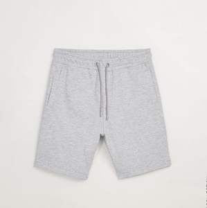 Pantalones cortos de chándal personalizados para hombre Diseño de punto transpirable Logotipo personalizable Patrón sólido Varios estilos Varias telas ODM - Product Image 1