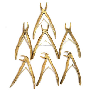 Juego de fórceps de extracción Dental chapados en oro de acero inoxidable Manual de 7 piezas | Instrumentos quirúrgicos de eliminación de dientes de bebé pedodónticos - Product Image 1