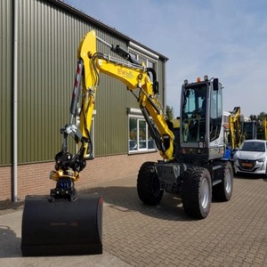 รถขุดไฮดรอลิกแบบมีล้อ Wacker Neuson EW65 รุ่นวิศวกรรมขั้นสูง ความจุบุ้งกี๋ 2.1 เมตร ใช้พลังงานน้อย รับประกัน 3 ปี - Product Image 1