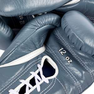 Guantes de Boxeo de Cuero Ligeros de Alta Calidad con Diseño OEM, con Cordones y Protección Impermeable y Cortavientos en la Muñeca para Entrenamiento - Product Image 4