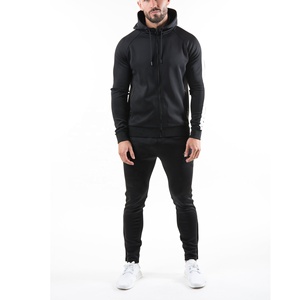 Survêtements Survêtements pour hommes Sweats à capuche unis et pantalons de survêtement à cordon Terry Streetwear Ensembles de sweats à capuche pour hommes - Product Image 1