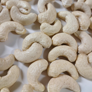 Nueces secas hechas en Vietnam, anacardos Kaju, servicio de nueces y granos SANTIGO WW210 24/24 - Product Image 1