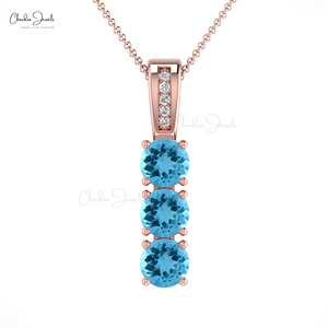 Pendentif délicat en or massif 14 carats avec diamant blanc rond de 0,90 mm et topaze bleue suisse sertie à 4 griffes, pierre de naissance double - Product Image 1
