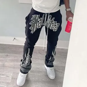 กางเกงวอร์มขาบานสำหรับผู้ชายผ้าฟลีซแบบปักลาย - Product Image 1